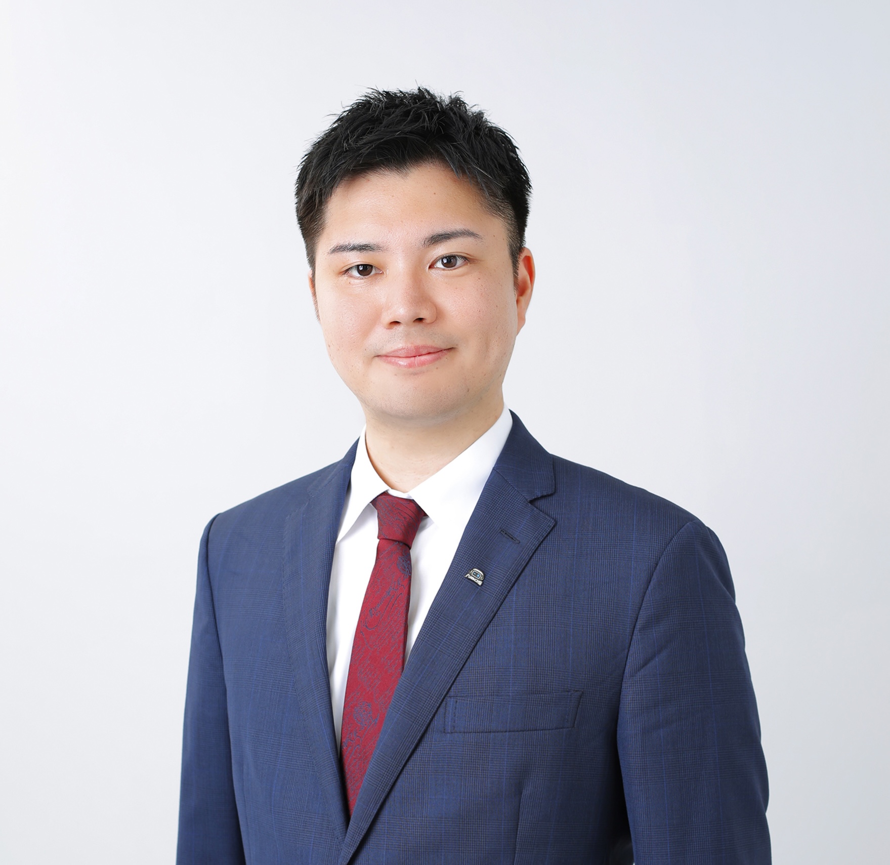 Photo of Masato Matsuzaki, CEO of AIBOS Inc.